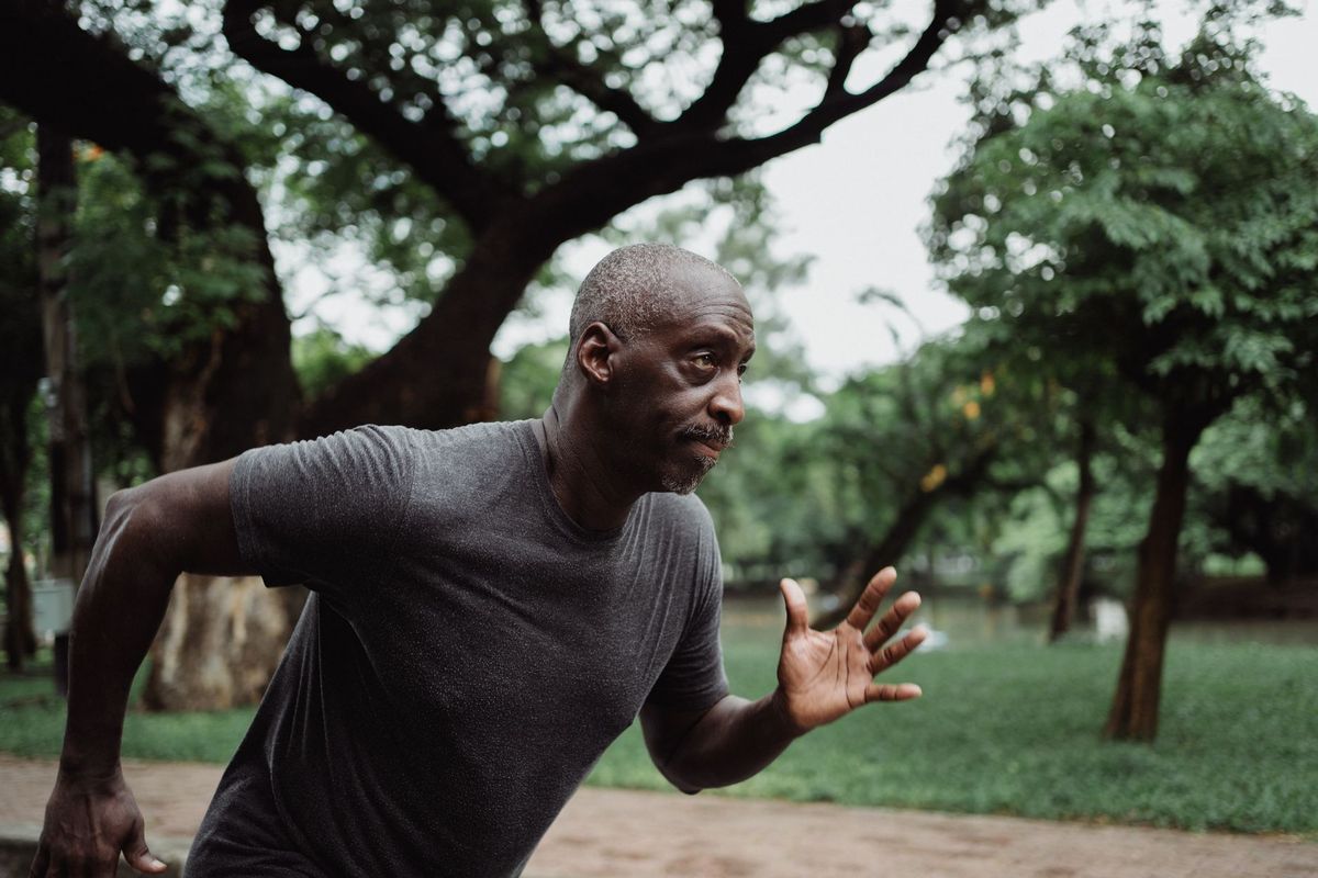Man in his forties running outdoors