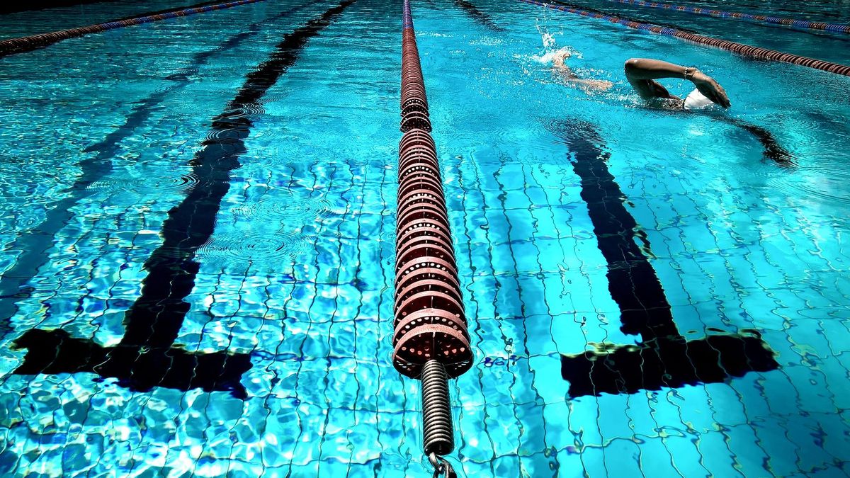 Swimmer training in a lap pool